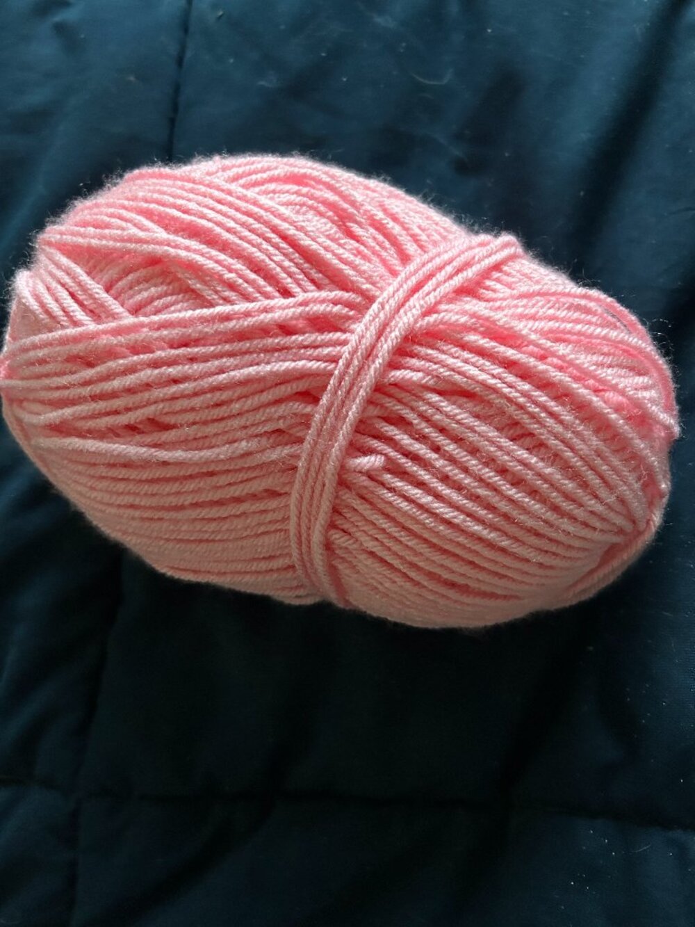 Spool of Light Pink Yarn